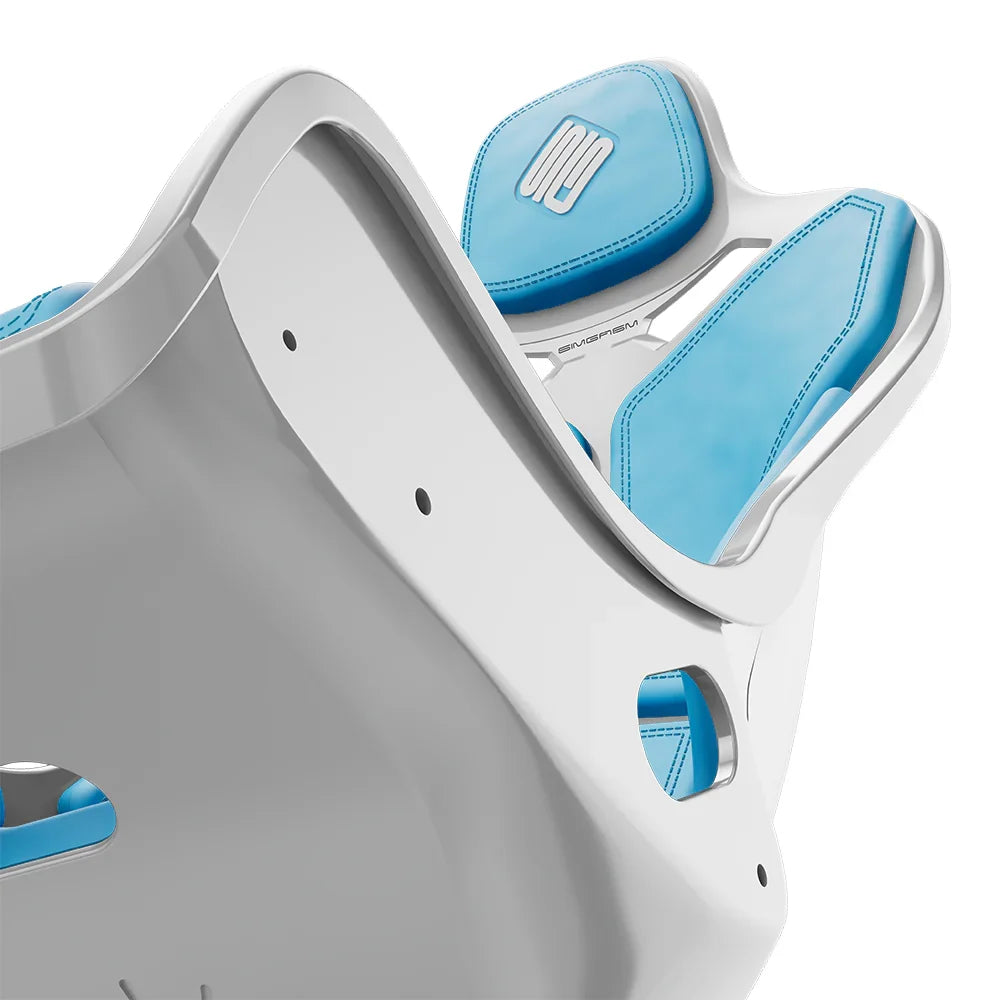 Close-up of the blue cushions and side opening on the white-shell SIMGASM Atlas Formula seat