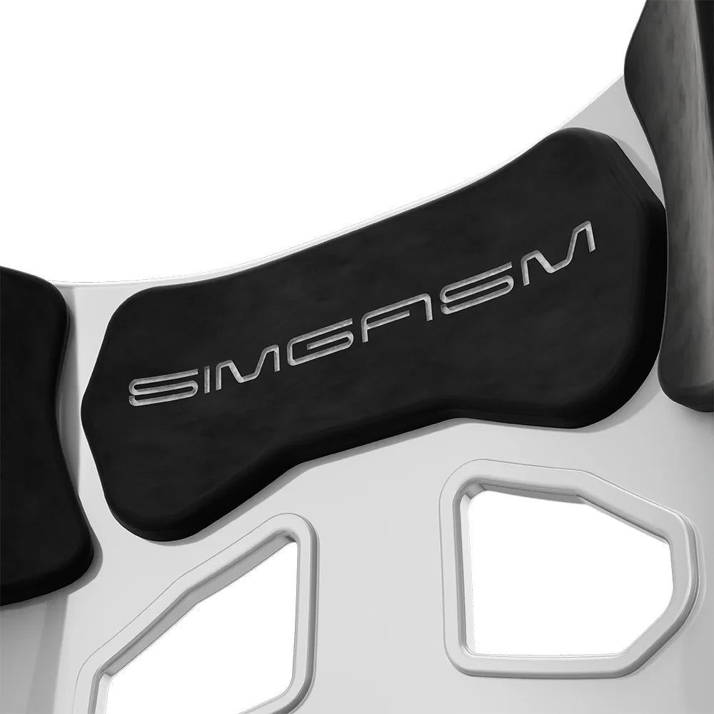 Close-up of the black upper backrest cushion on the white-shell SIMGASM Atlas GT seat