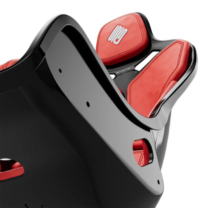 Close-up of the red cushions and side opening on the black-shell SIMGASM Atlas Formula seat