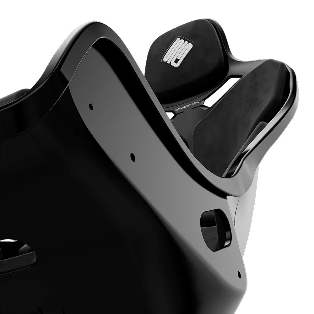 Close-up of the black cushions and side opening on the black-shell SIMGASM Atlas Formula seat