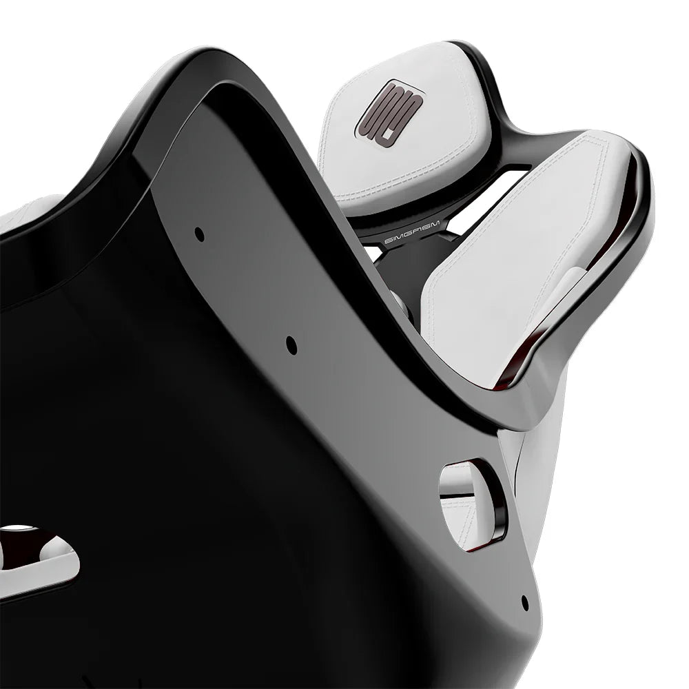 Close-up of the white cushions and side opening on the black-shell SIMGASM Atlas Formula seat