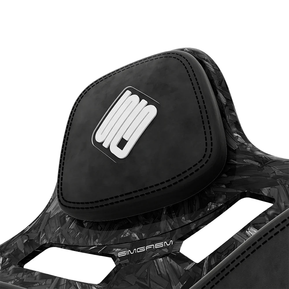 Close-up of the black headrest cushion on the SIMGASM Atlas Formula seat with a Forged Carbon Look shell