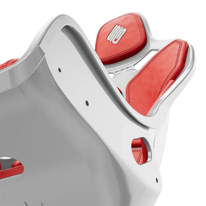 Close-up of the red cushions and side opening on the white-shell SIMGASM Atlas Formula seat