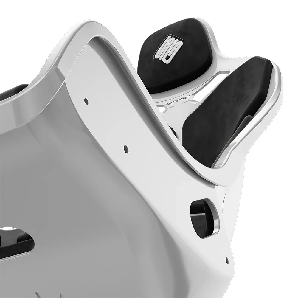 Close-up of the black cushions and side opening on the white-shell SIMGASM Atlas Formula seat
