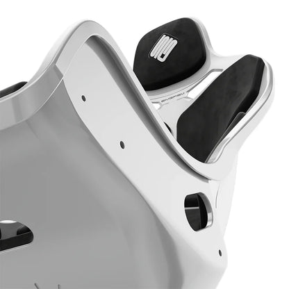 Close-up of the black cushions and side opening on the white-shell SIMGASM Atlas Formula seat