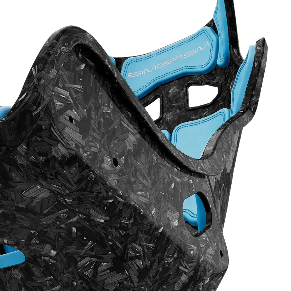 Close-up of the blue cushions and side shell on the SIMGASM Atlas GT seat with a Forged Carbon Look shell