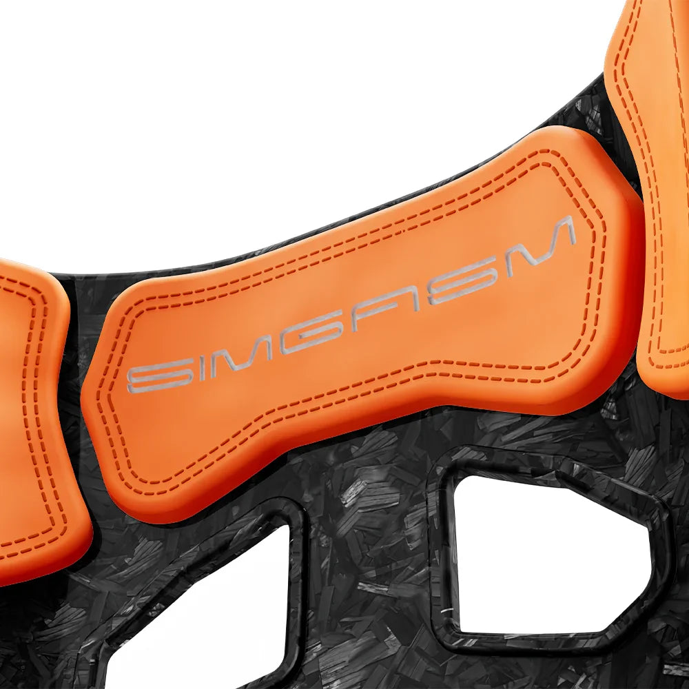 Close-up of the orange upper backrest cushion on the SIMGASM Atlas GT seat with a Forged Carbon Look shell