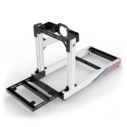 SIMGASM Club Marini sim racing cockpit, front-mount wheel plate, pedal-end three-quarter studio view