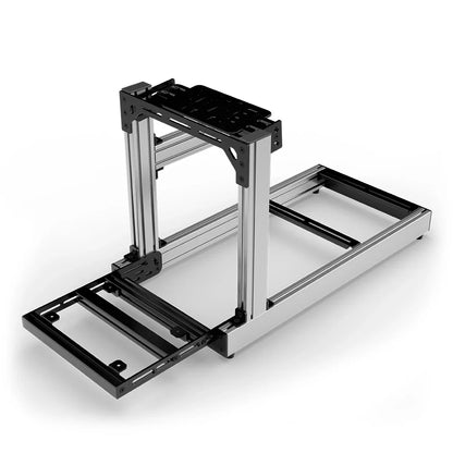 SIMGASM Club silver sim racing cockpit, bottom-mount wheel deck, pedal-end three-quarter studio view