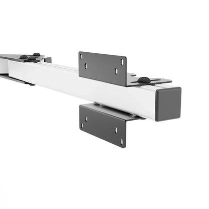 Close-up of the VESA brackets fitted to the white SIMGASM Core monitor-stand side-arm set