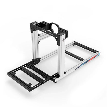 SIMGASM Hobby Marini sim racing cockpit, arched wheel-mount plate, pedal-end three-quarter studio view
