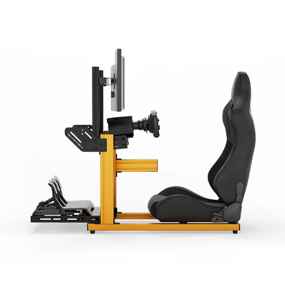 SIMGASM Hobby orange sim racing cockpit, black reclining seat and monitor, side-profile studio view