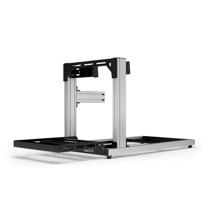 SIMGASM Hobby silver sim racing cockpit, side-mount wheel brackets, end-on studio view