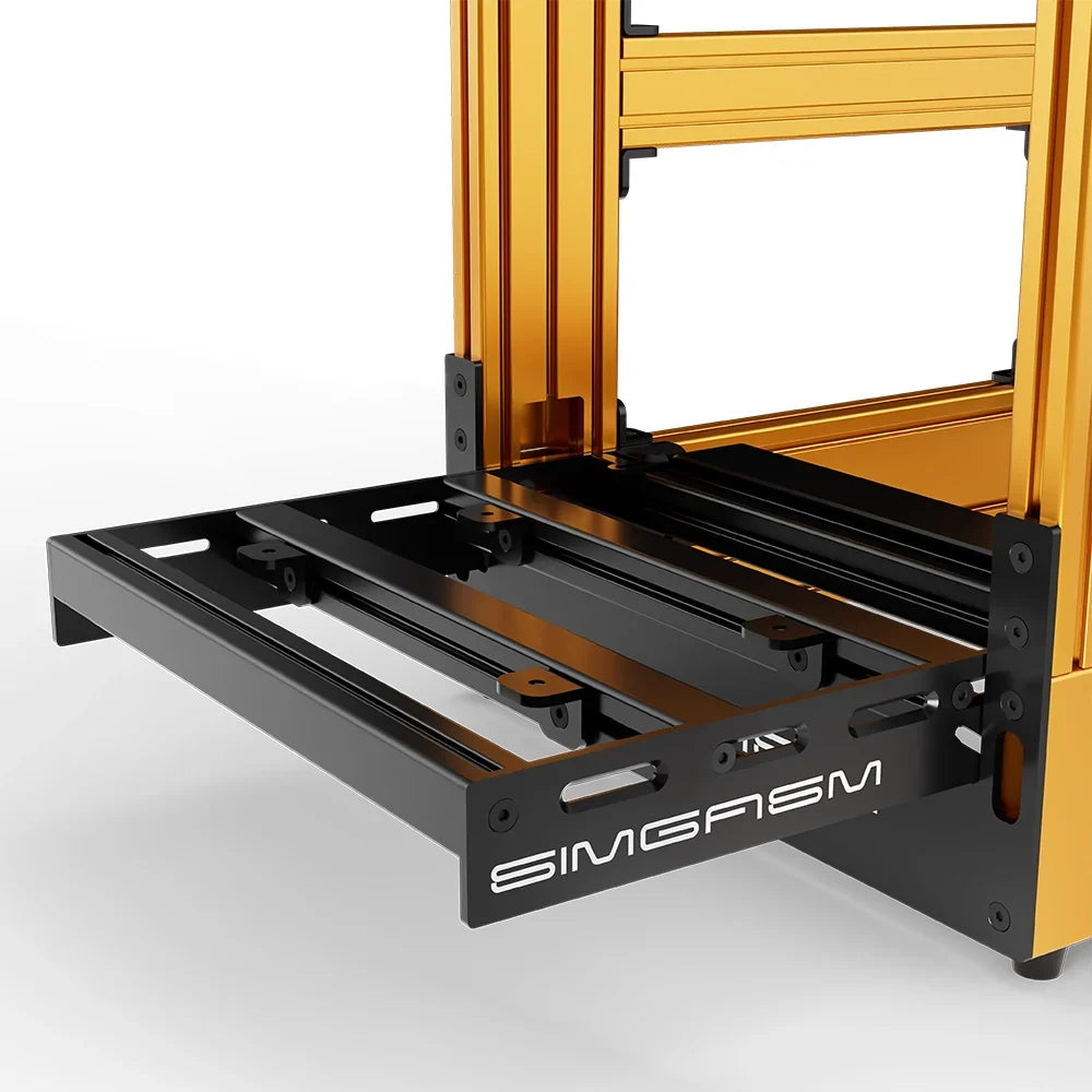 Orange SIMGASM Pro sim racing cockpit, close-up of the pedal tray and SIMGASM logo plate