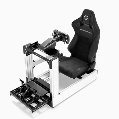 White SIMGASM Pro sim racing cockpit with MOZA gear and black reclining seat, front three-quarter with pedals